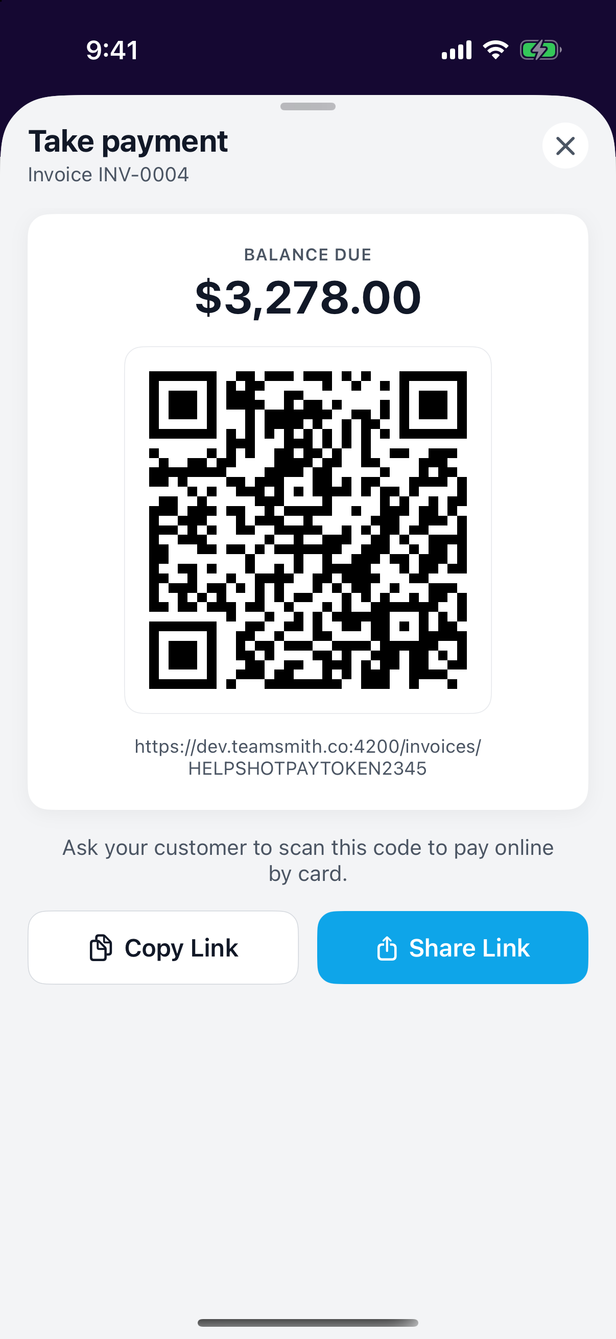 The Take Payment screen with a QR code in the mobile app